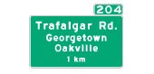 Ontario road sign: Freeway interchanges or exits have numbers that correspond to the distance from the beginning of the freeway