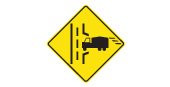 Ontario road sign: Truck entrance on the right side of the road ahead if the sign shows the truck on the left the entrance is on the left side of the road