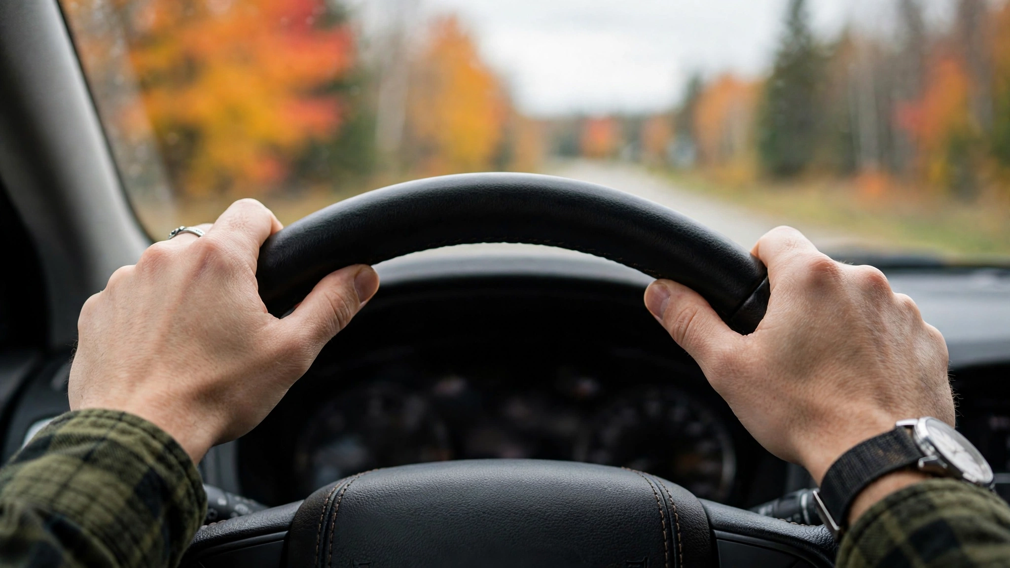 Close-up of hands on a steering wheel — Ontario G1 practice