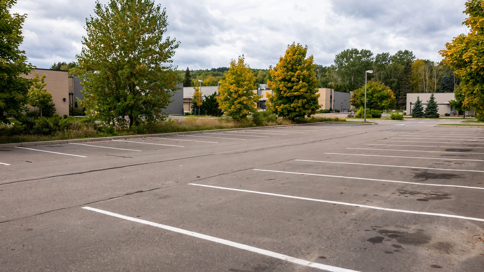 Empty parking lot with painted lines — Ontario G1 practice